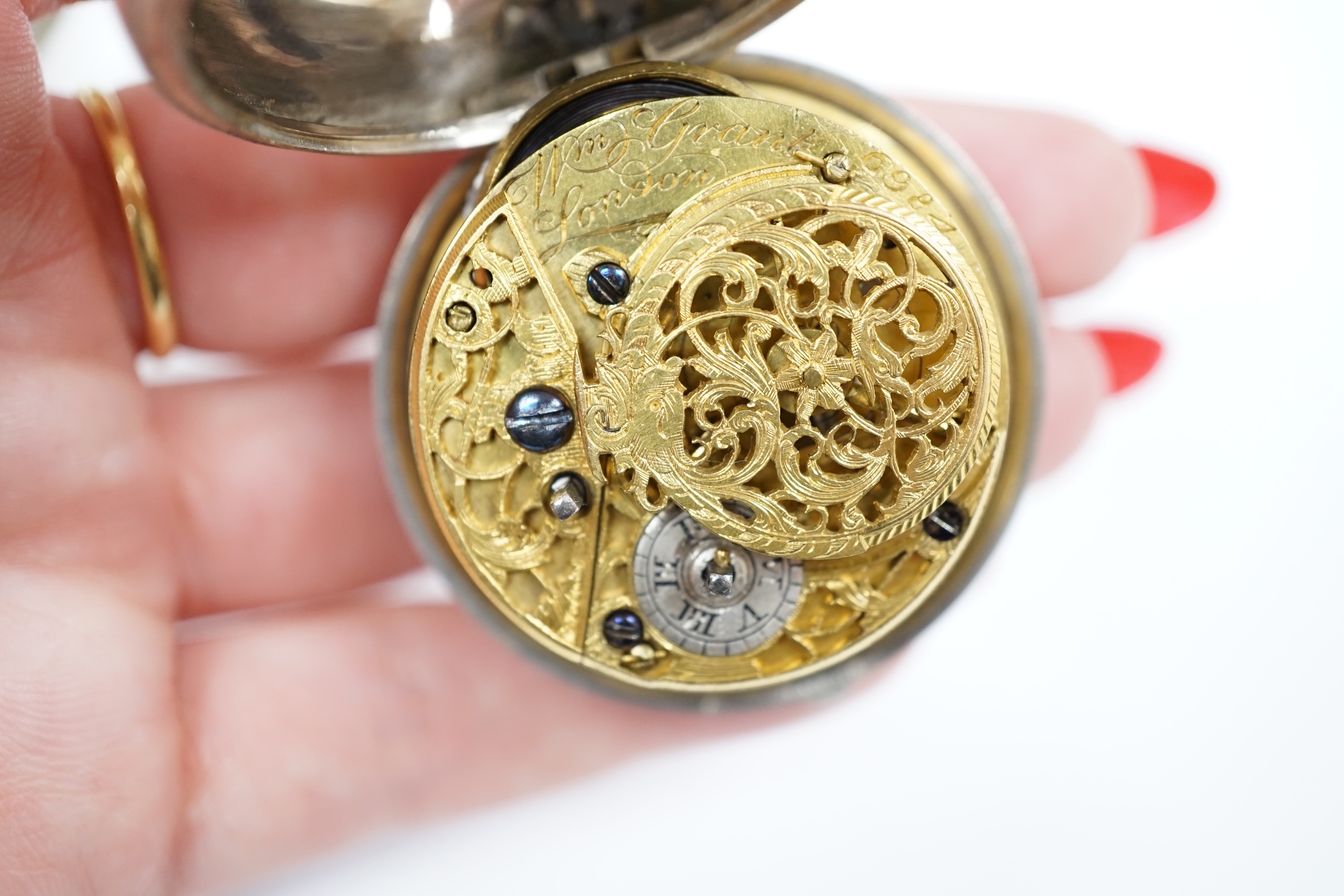 A late George II silver pair cased keywind verge pocket watch by William Grant of London, with Roman dial, the signed movement numbered 6984, outer case diameter 48mm.